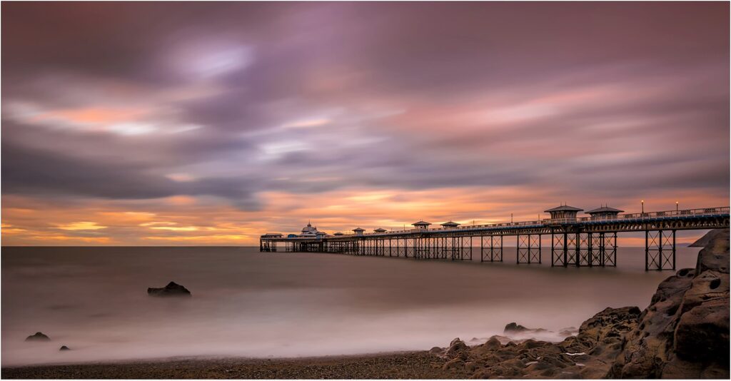 Llandudno pier sunset by Ande Van de Sande
