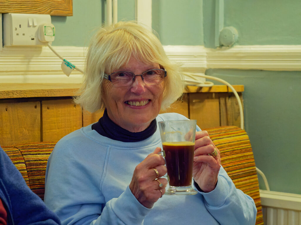 Sue (with coffee) by Trevor Waller